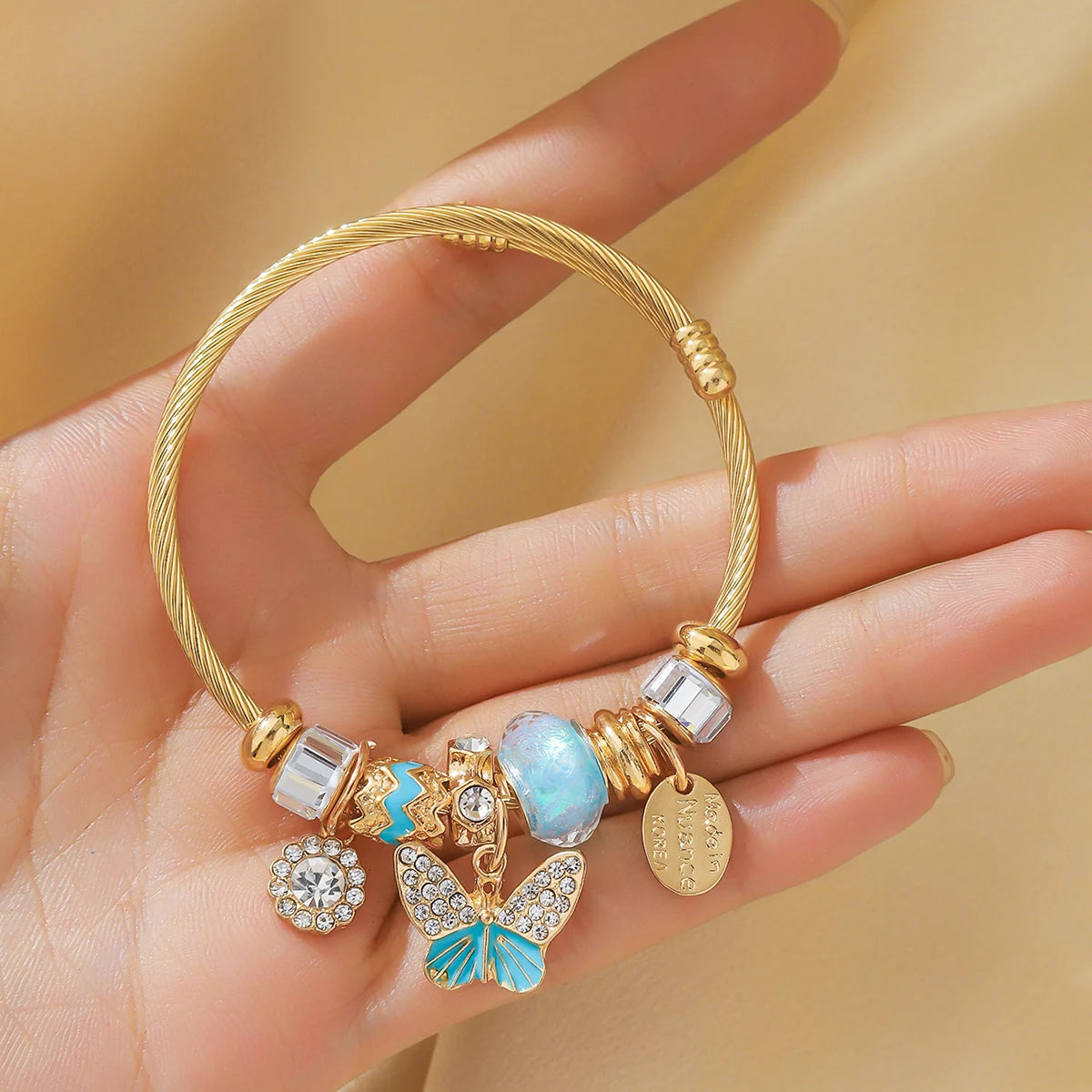 Gold bracelet with butterfly